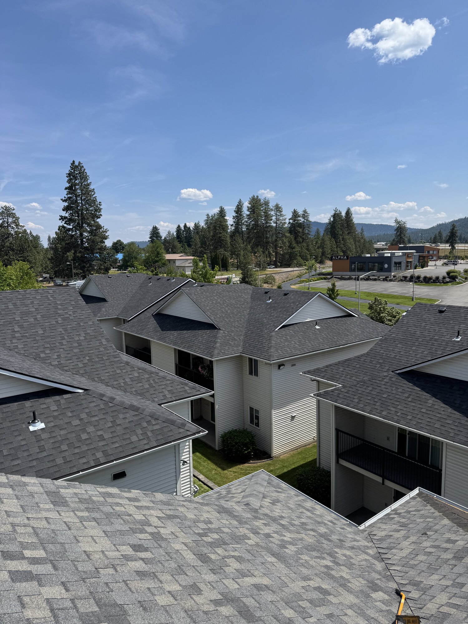 Aerial view of multi-building commercial roofing complex